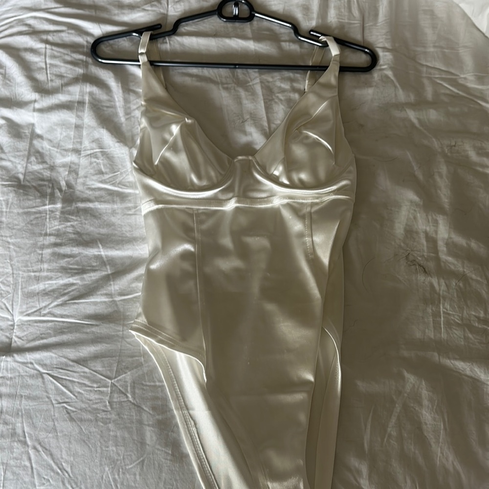 white silky body suit